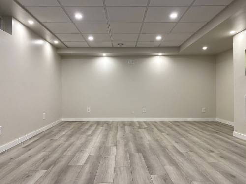 Marc LaBossiere / Winnipeg Free Press
                                The rec-room was redesigned from bare studs and concrete sub-floor and fully renovated from head to toe.