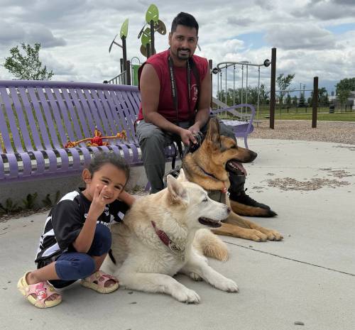 SUPPLIED
                                Andrew Din, co-founder of Back to Pack Rescue, with his daughter and Benny, who he rehabilitated after the dog spent two years in the Winnipeg Humane Society shelter because of behavioural issues. Din is holding Benny, and his daughter is holding their other dog Luna.