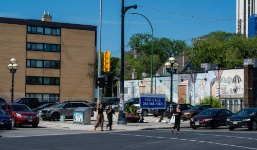 ROBERT LEE / FREE PRESS
                                A for-sale sign marks the long-vacant lot at 145 Osborne St. in Osborne Village.
