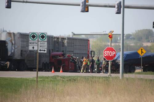 First responders at Highway 110 and Richmond Avenue East in Brandon after the crash that killed Xiaoyun Zhang. (Alex Lambert/The Brandon Sun files)