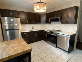 Photos by Marc LaBossiere / Free Press
                                The look of the old kitchen transformed into a more modern esthetic.
