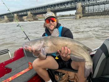 SUPPLIED
                                Winnipeg Goldeyes pitcher Quinn Waterhouse shows off one of the catfish he caught after his host family, Charlie and Cindy Goodman, took him on the Red River in Lockport.