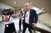 Coun. Russ Wyatt tries to evade reporters as he walks into City Hall on Thursday. (Ruth Bonneville / Free Press)
