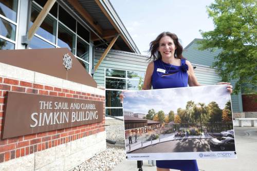 RUTH BONNEVILLE / FREE PRESS
                                Local Simkin Child Care CEO of the Saul & Claribel Simkin Centre, Laurie Cerqueti, with drawings outside the centre after press conference announcing the opening of new Child Care Centre to be built onto existing centre, Monday. This new centre will offer Intergenerational programs bring older adults and children together for shared learning and cultural exchange. Also speaking at the event were representatives of the provincial and federal government including: Education and Early Childhood Learning Minister Tracy Schmidt Ben Carr, member of Parliament, Winnipeg South Centre and others. See story by Maggie Aug 1th,, 2026