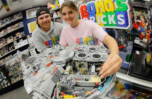 JOHN WOODS / FREE PRESS
                                Ashton Romaniuk and Madison Froome with a Lego 75192 Millennium Falcon in their recently opened store Romo&rsquo;s Bricks at 955 Milt Stegall Dr.