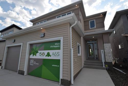 The 1,500 sq. ft., two-storey attached home at 273 Moonlight Bay is loaded with style and function.