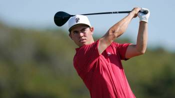 Vera Nieuwenhuis / The Associated Press
                                Alabama&rsquo;s Thomas Ponder tees off during an NCAA golf tournament in 2023.