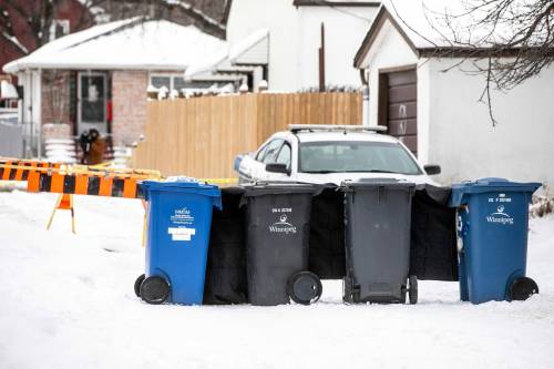 MIKAELA MACKENZIE / FREE PRESS FILES
                                The body of the victim was left in a garbage bin in an alley behind Wellington Avenue.