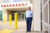20082026 Dr. Scott Blyth outside the emergency department at the Brandon Regional Health Centre on Thursday. Blyth is a member of the Canadian Association of Physicians for the Environment (CAPE) and has studied the health impacts of air pollution and climate change, including health impacts from the Manitoba Hydro Generating Station in Brandon. (Tim Smith/The Brandon Sun) **Please cross reference details with Rylee story***