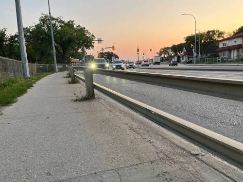 Russell Wangersky/Free Press
                                On McPhillips Street, the fastest traffic is often in the curb lane, closest to pedestrians and bikes.