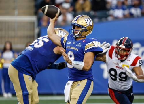 John Woods / The Canadian Press
                                Winnipeg Blue Bombers quarterback Zach Collaros (8) throws during first half action against the Montreal Alouettes in Winnipeg on Friday.