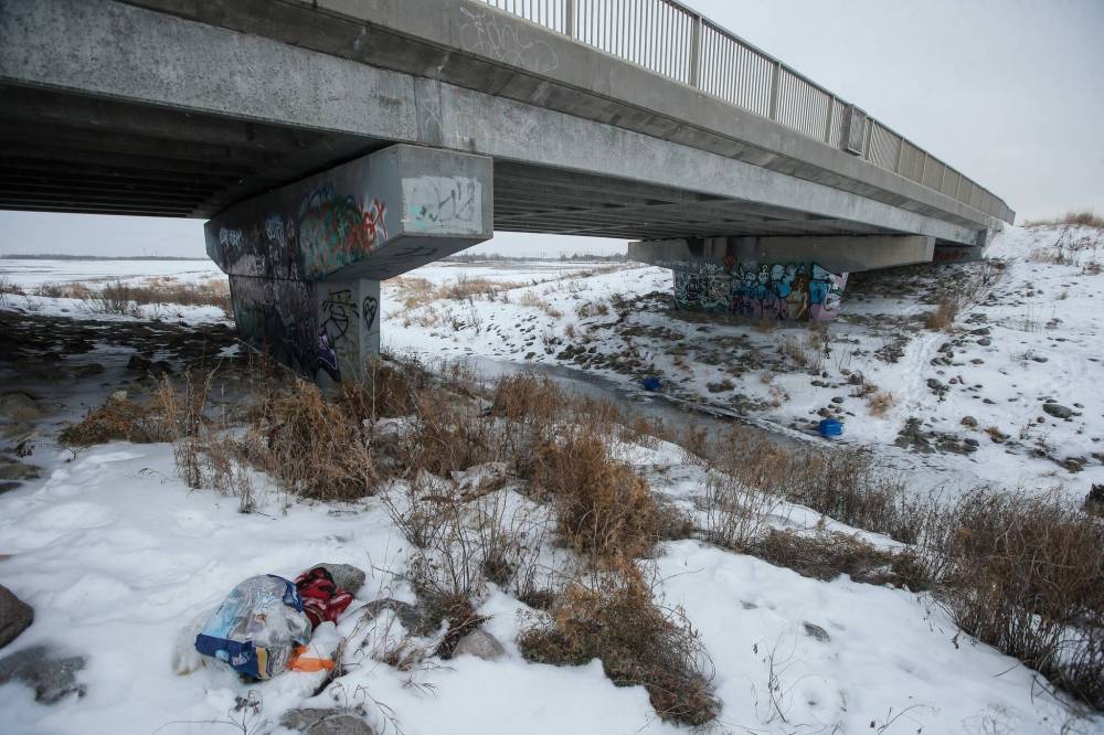 JOHN WOODS / FREE PRESS
                                Investigators were sent to this Summit Road bridge which crosses Sturgeon Creek to investigate dead cats found in December of last year.