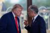 THE ASSOCIATED PRESS FILES
                                U.S. President Donald Trump speaks with Canadian Prime Minister Mark Carney (right) at a working lunch with leaders of G7 and the Middle East in Evian-les-Bains, France in June.
