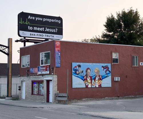 John Longhurst photo
                                The billboard promoting Christianity on Henderson Highway is created and sponsored by an Amish/Mennonite organization called Christian Aid Ministries.
