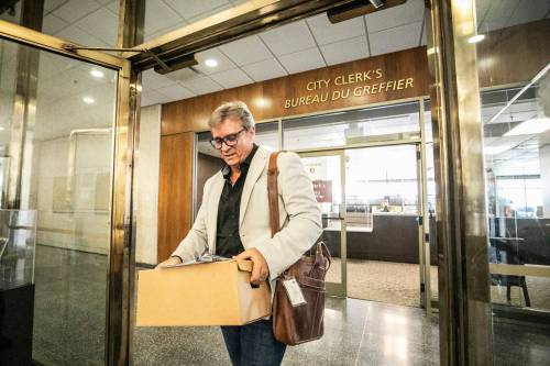 MIKAELA MACKENZIE / FREE PRESS 	 Kevin Klein registers for the mayoral race at City Hall on Thursday, Sept. 3, 2026. For Malak story. Free Press 2026