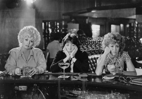 TWENTIETH CENTURY-FOX
                                Fed up with their lowly professional status, office workers Dolly Parton (from left), 	Lily Tomlin and Jane Fonda commiserate over drinks in the 1980 hit comedy 9 to 5.