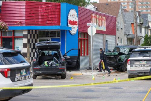 MIKE DEAL / FREE PRESS
                                Broadway was closed Friday between Furby and Young streets until further notice.