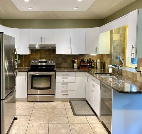Marc LaBossiere photos / Free Press 
                                The new cabinet fronts brighten up the kitchen.
