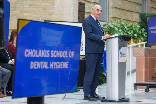 MIKE DEAL / FREE PRESS
                                Dr. Ernest Cholakis is celebrated Thursday morningin the University of Manitoba&rsquo;s Brodie Centre Atrium for his philanthropic gift of $2 million in support of dental care in Manitoba.