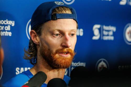 Mike Deal / FREE PRESS
                                Winnipeg Jets forward Kyle Connor, who is close friends with goalie Connor Hellebuyck, said Thursday there were &lsquo;signs throughout the whole summer&rsquo; that the netminder had not returning to the club for the season on his mind.