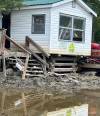Nigel Simms photo
                                Flood damage at the Asessippi ski club. Months after devastating flooding in June and July, businesses in western Manitoba are still rebuilding, with some racing against the clock to prepare for winter.