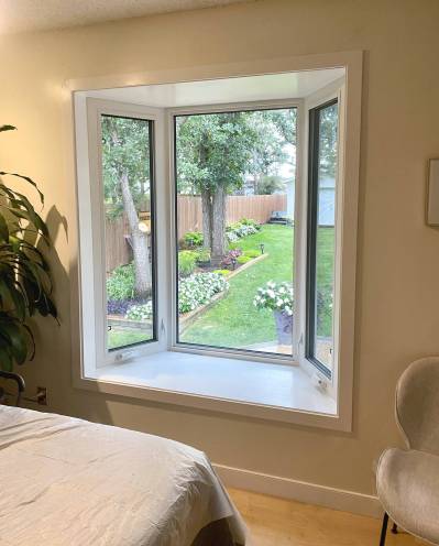 Marc LaBossiere photos / Free Press
                                The headboard and seatboard were painted white to match the window casings.