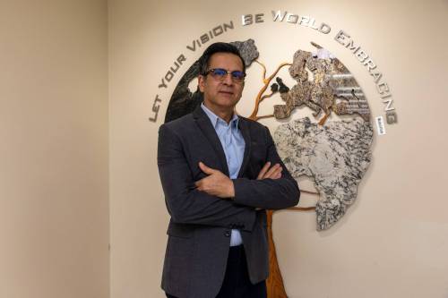 BROOK JONES / FREE PRESS
                                State Group president Payam Towfigh in front of a mural touting the Winnipeg company&rsquo;s vision statement. &lsquo;I&rsquo;m really proud of our staff … because together we have come a long way,&rsquo; he says of his 34 years of owning the business.