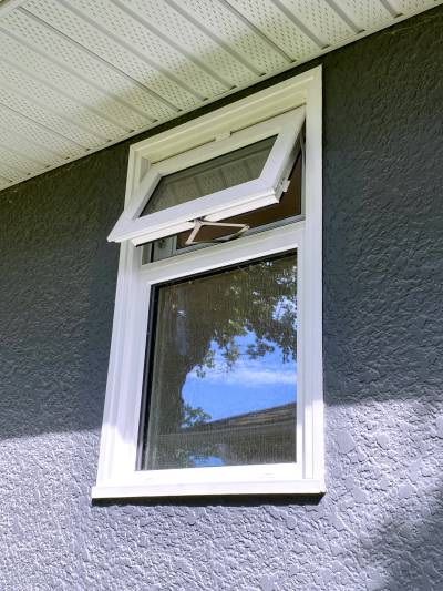 Marc LaBossiere photos / Free Press
                                The new window was ordered to fit within the existing stucco exterior.