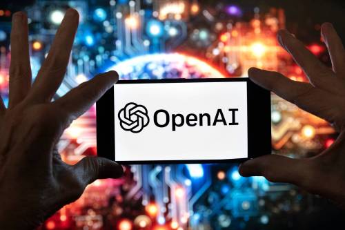 FILE
                                The OpenAI logo displayed on a cell phone.