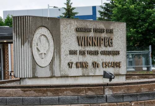 JOHN WOODS / FREE PRESS FILES
                                The main gate at Canadian Forces Base 17 Wing in Winnipeg.