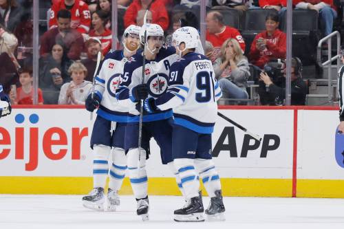 Duane Burleson / THE ASSOCIATED PRESS
                                Winnipeg Jets centre Cole Perfetti (right) and winger Kyle Connor (left) have already combined for five goals and 10 points in three games.