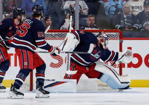 THE CANADIAN PRESS/John Woods
                                Winnipeg Jets goaltender Stuart Skinner (74) saves the Colorado Avalanche shot during second period NHL hockey action in Winnipeg on Wednesday.