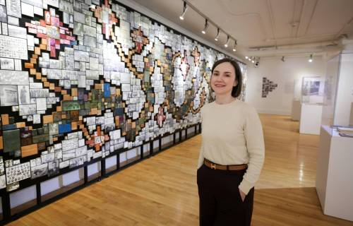 Photos by Ruth Bonneville / Free Press
                                Olesia Sloboda, curator of collections, gives a tour of four exhibits at Oseredok. The Ukrainian Voice, Legacy Mosaic by artist Larisa Sembaliuk Cheladyn captures the history of Ukrainian Canadians from the early 1920s to the mid-1990s. Inspired by traditional embroidery, this tribute to Canadian photojournalism is crafted from 2,674 vintage wood-and-metal printing tiles originally used by Trident Press to publish the Ukrainian Voice newspaper.  Story: Oseredok Ukrainian Cultural Centre unveils four new exhibits  Reporter: Conrad OCT 14TH, 2026
