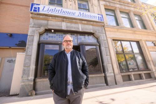 Mike Sudoma / Free Press
                                Peter McMullen, executive director of Lighthouse Mission, stands outside of the newly renovated facility on Main Street on Friday. He says one of the goals of the program will be for clients to find appropriate treatment programs while they&rsquo;re still receiving detox services.