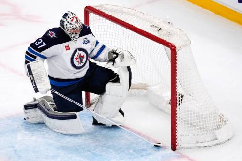 CHARLES KRUPA / THE ASSOCIATED PRESS FILES
                                It&rsquo;s anyone&rsquo;s guess if Winnipeg Jets goaltender Connor Hellebuyck will return to the team after his suspension is lifted on Friday.