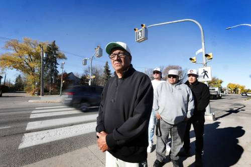 Ruth Bonneville / Free Press
                                From left: Brad Beardy, uncle of Gabe Beardy, along with Gabe&rsquo;s cousin&rsquo;s, Jules Beardy, Victor Ryle and Kyle Menard, stand at the intersection of Henderson Highway and Neil Avenue where Gabe was fatally struck by a vehicle in spring. They are calling for Winnipeg police to release more information about the circumstances surrounding his death