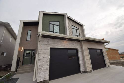 TODD LEWYS / FREE PRESS
                                The Wilkens model is an inspired two-storey attached design that delivers outstanding functionality, flair and value.