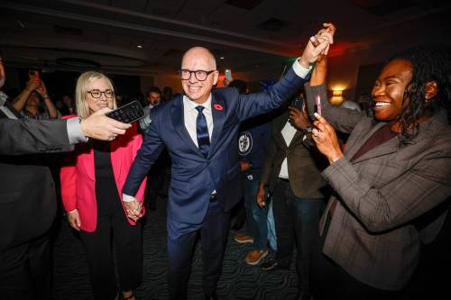 JOHN WOODS / FREE PRESS
                                Scott Gillingham celebrates winning the mayoral race with supporters at a Winnipeg hotel Wednesday night.
