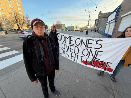 Morgan Modjeski/Free Press
                                Lucky Adams, a volunteer with Streets for People Winnipeg, attends a vigil Friday for a man in his 60s who was recently hit and killed while crossing Main Street. Adams says the group wants to see the street narrowed and the speed limit lowered.