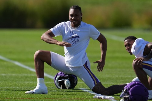 Minnesota Vikings wide receiver Justin Jefferson stretches during an NFL football practice Wednesday, Oct. 7, 2026, in Eagan, Minn. (AP Photo/Abbie Parr)