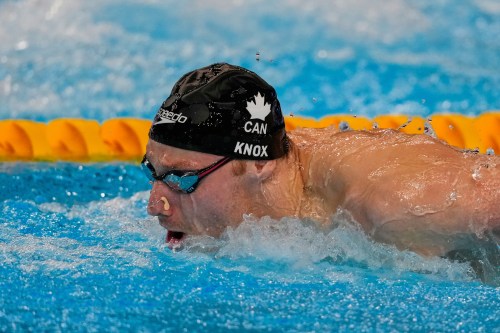 Finlay Knox of Canada competes in the men's 200-meter individual medley heats at the World Aquatics Championships in Singapore, Wednesday, July 30, 2025. (AP Photo/Vincent Thian)