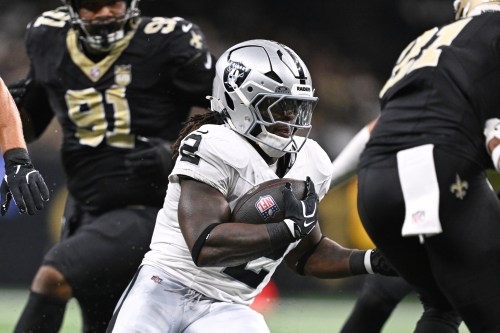 Las Vegas Raiders running back Ashton Jeanty (2) runs the ball during the first half of an NFL football game against the New Orleans Saints in New Orleans, Sunday, Sept. 27, 2026. (AP Photo/Ella Hall)