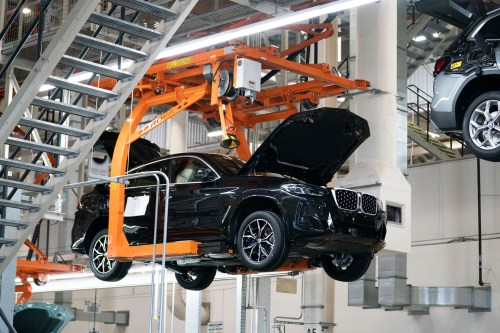 FILE - Cars are pictured on the assembly line at the BMW Spartanburg plant in Greer, S.C., October 19, 2022. (AP Photo/Sean Rayford, File)