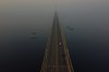 The Jornalista Phelippe Daou Bridge is shrouded in smoke from wildfires in Manaus, Amazonas state, Brazil, Friday, Oct. 9, 2026. (AP Photo/Edmar Barros)