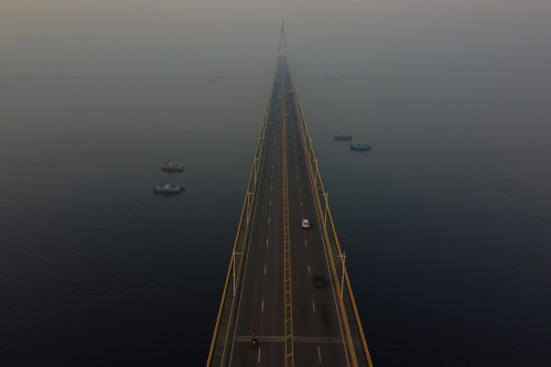 The Jornalista Phelippe Daou Bridge is shrouded in smoke from wildfires in Manaus, Amazonas state, Brazil, Friday, Oct. 9, 2026. (AP Photo/Edmar Barros)